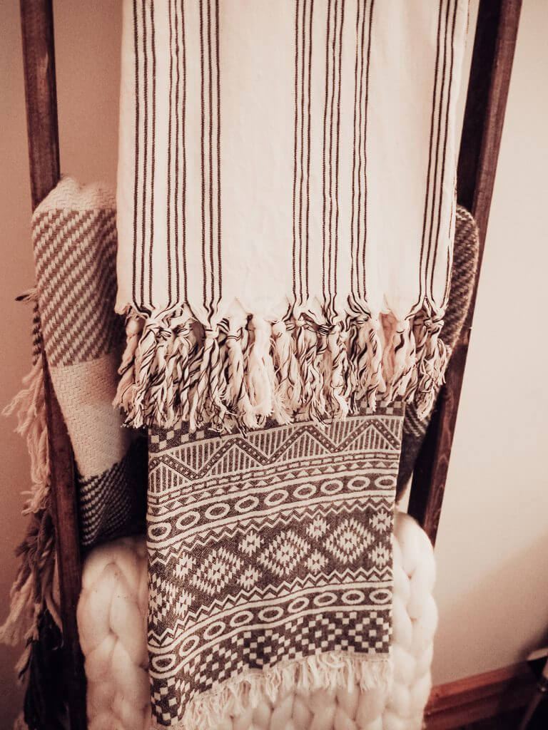 Add texture to your home with cosy blankets.