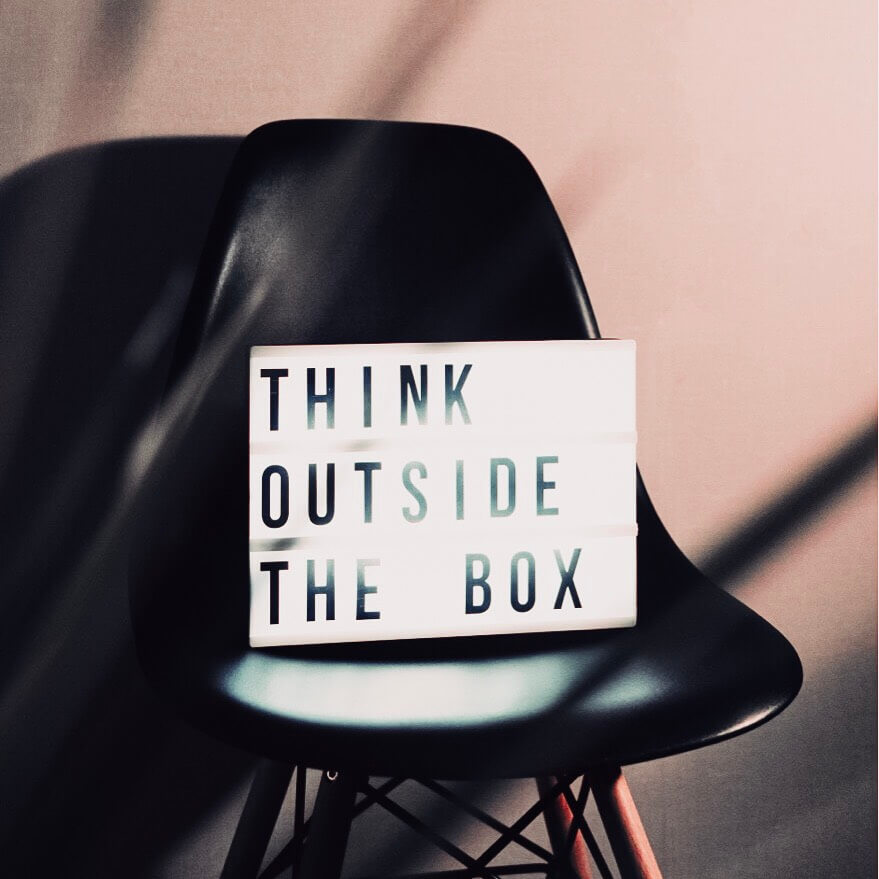 Image of a chair with a light box stating to think outside the box. A blog post on what to do if your Instagram accounts is hacked.