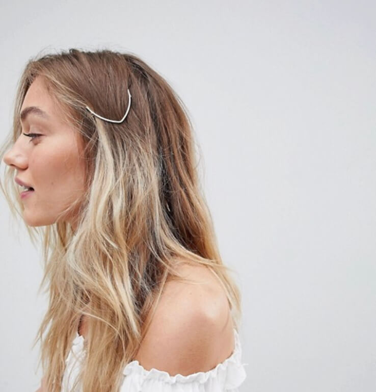 Orelia hammered gold arrow hair clip. Ten of the best hair accessories online. Read more on www.ouruniquestays.com