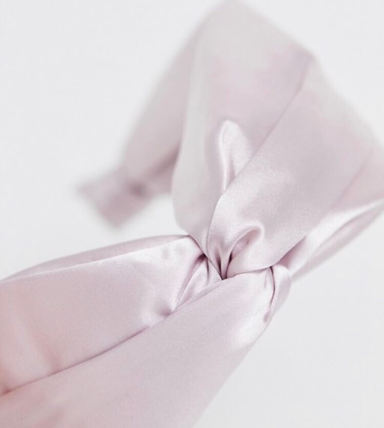 ASOS pink twist hairband. What to pack for the Cotswolds. Read more on www.ouruniquestays.com