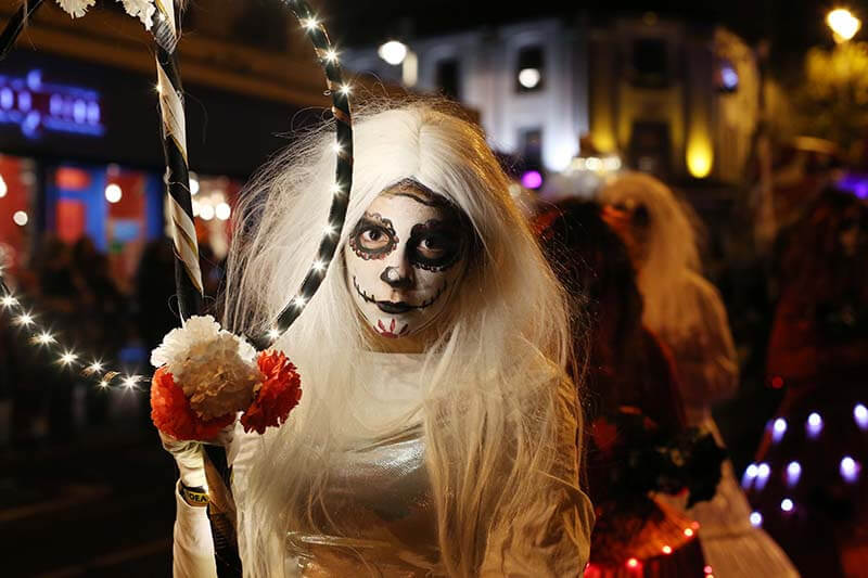 People dressed up in Halloween costumes during Halloween in Derry.