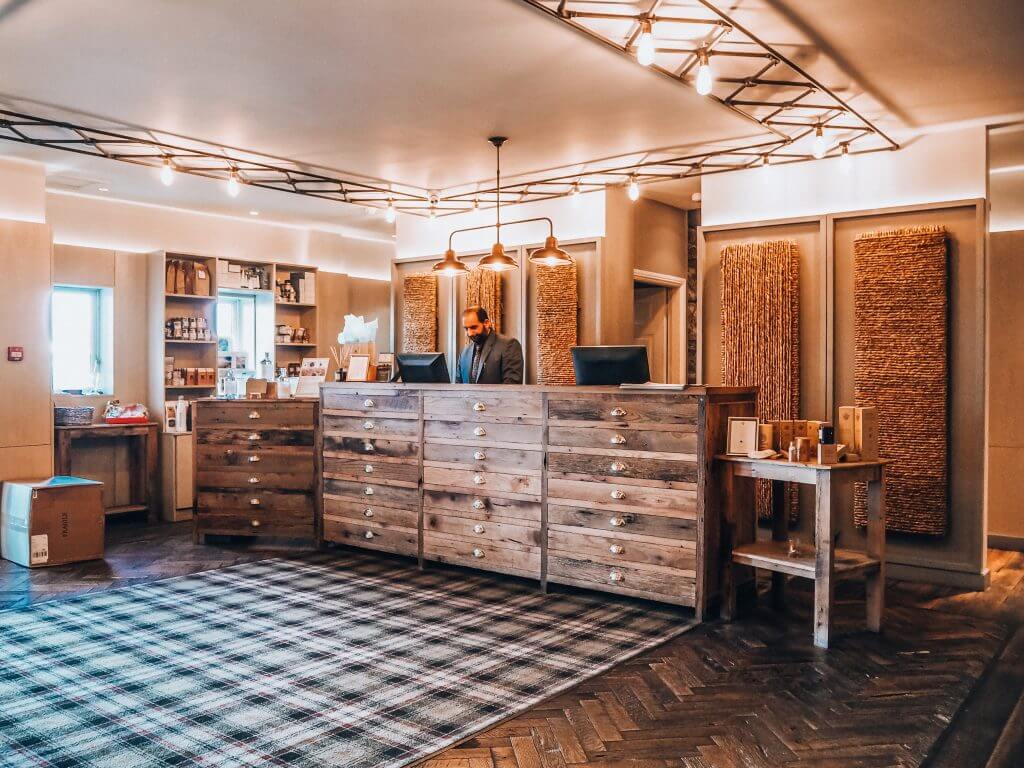 Man behind reception desk at Armada Spanish Hotel