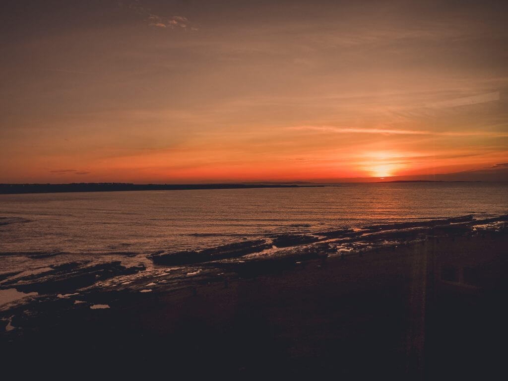 Sunset over the ocean on the Wild Atlanic Way in County Clare Ireland