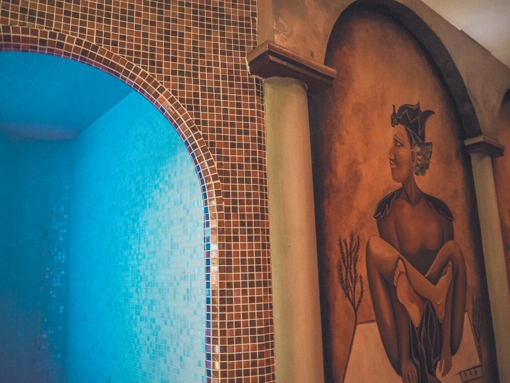 Wall mural painted beside mosaic tiles in the Thai spa of Lough Erne resort