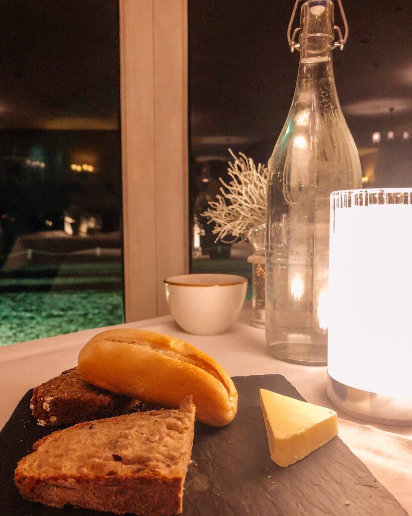 Bread and water on a restaurant table