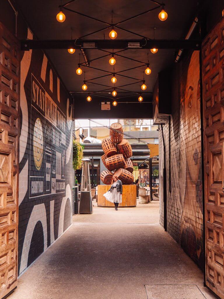 Woman twirling in her white dress at The Bullitt Hotel Belfast a brand collaboration for Instagram