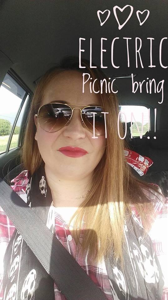 Women in a car on her way to a Music festival in Ireland