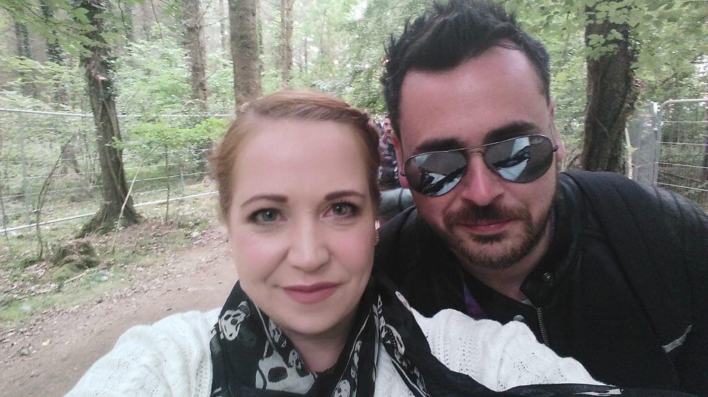 Couple at an Irish music festival listening to Indie and alternative love songs