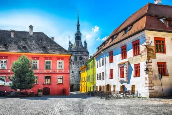 Stunning summer view of medieval city Sighisoara city and Clock Tower built by Saxons, Transylvania, Romania, Europe