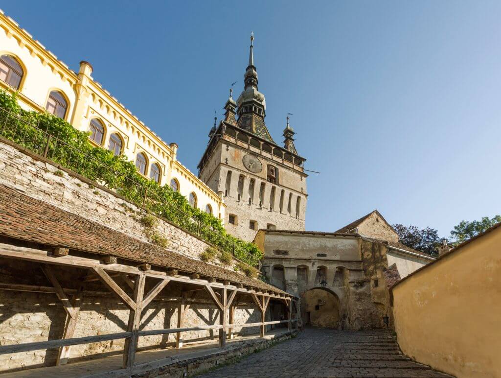 View of Sighisoara Clock Tower and an ancient street