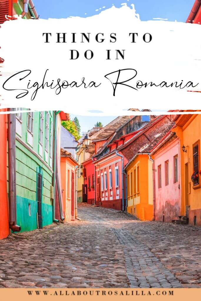 Image of the Romanian village of Sighisoara with text overlay things to do in Sighisoara