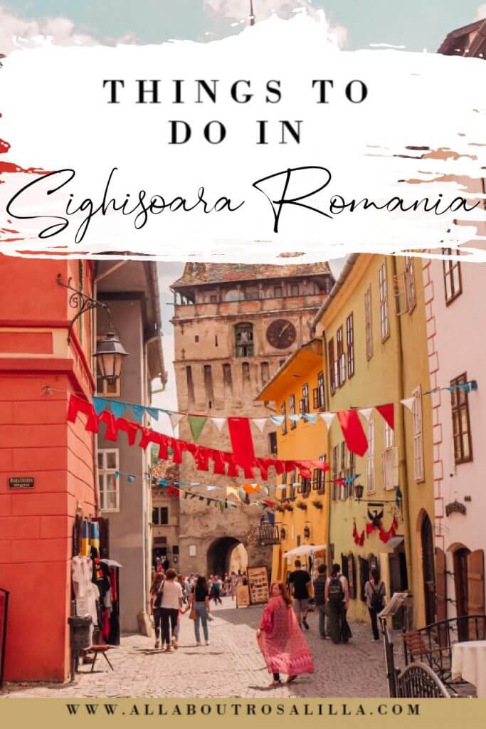 Image of the Romanian village of Sighisoara with text overlay things to do in Sighisoara