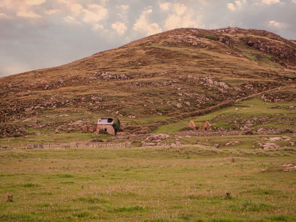 Country Cottage and stone walls at Murder Hole Beach in County Dongeal, the perfect place for your staycation Ireland.