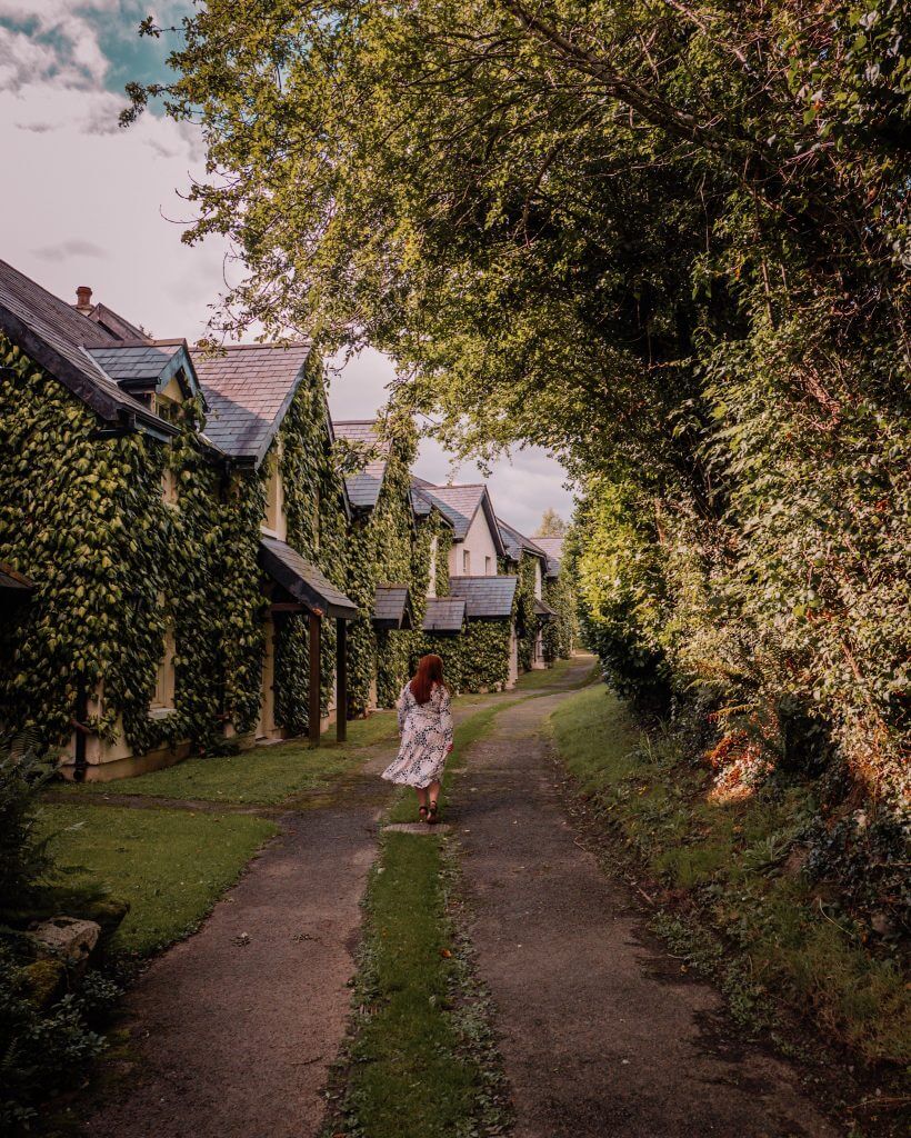 Woman walking the grounds of Brooklodge Hotel Ireland