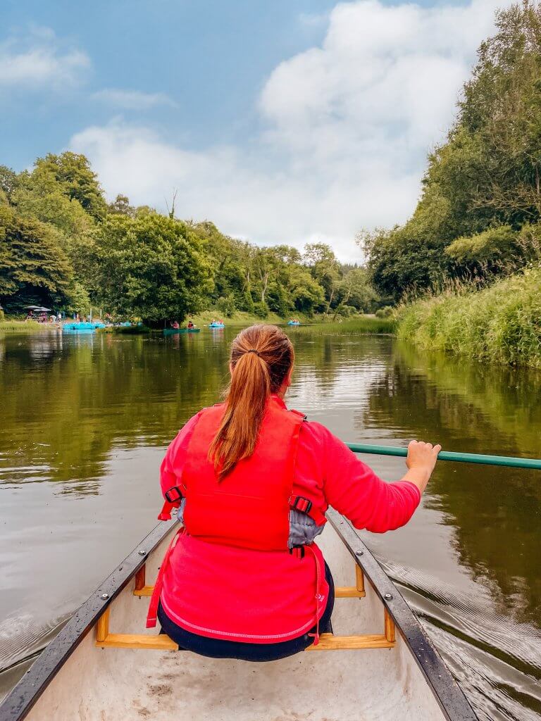 Woman canoeing in the lake at Castlecomer Discovery Park Kilkenny Ireland