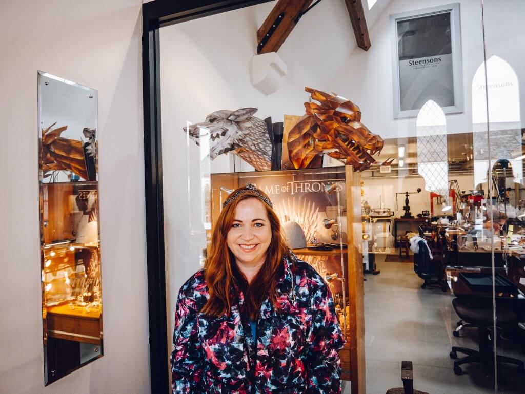 Woman with red hair wearing Sansa Stark's crown on a game of thrones Ireland tour