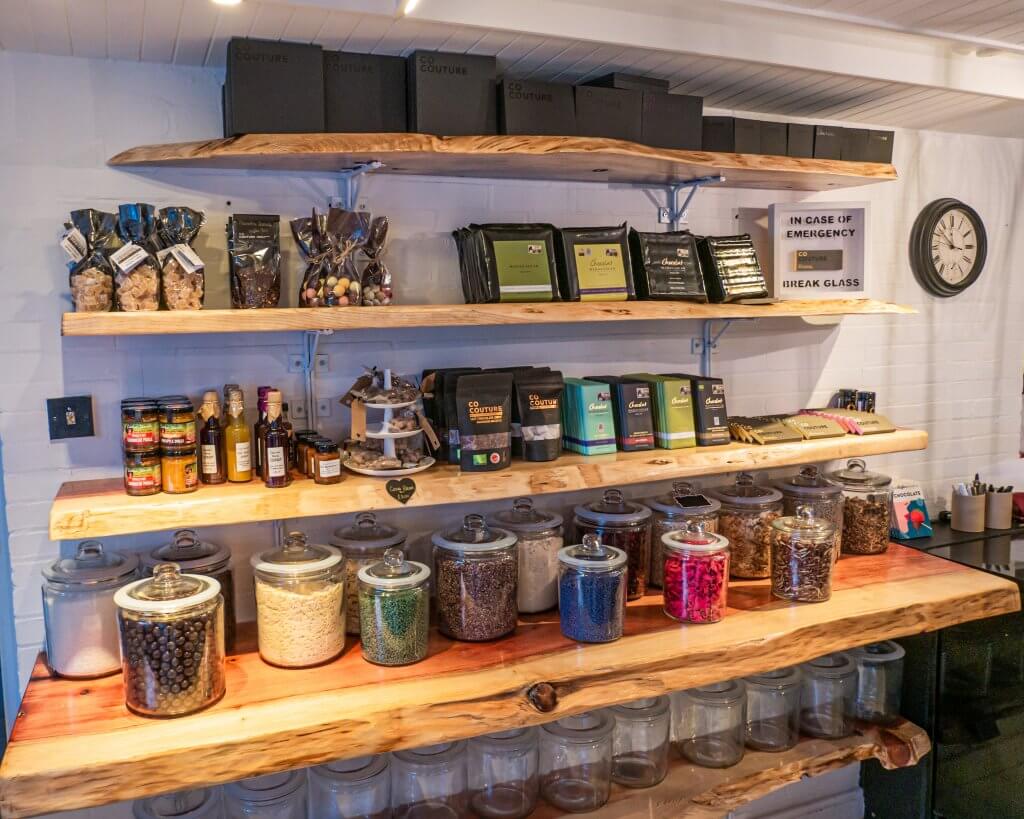 Sleeves stocked full of chocolate products at Co Couture Chocolate shop in Belfast city Northern Ireland