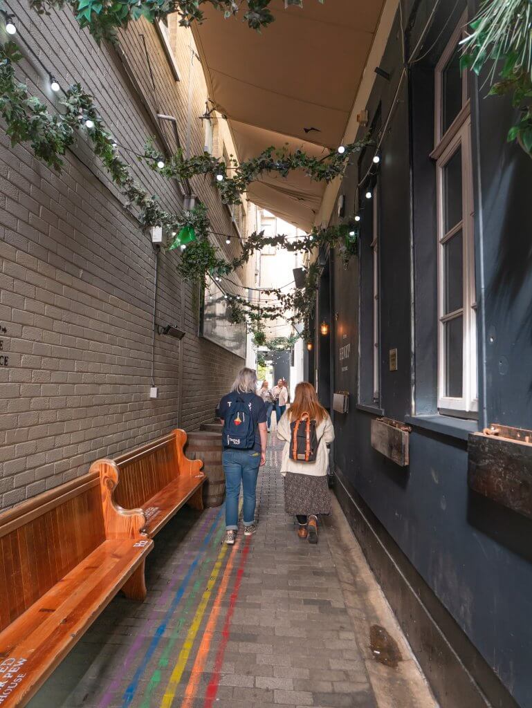 Woman taking a walking tour Belfast with Taste and Tour