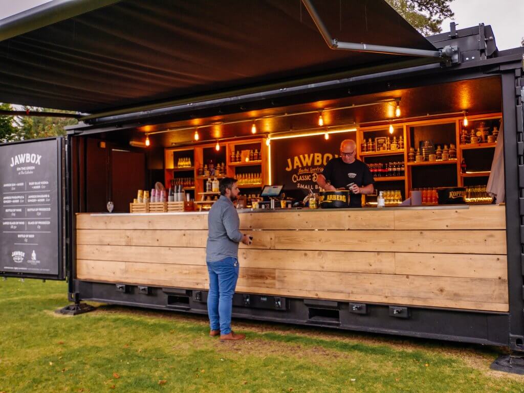 Man at the Jawbox Gin pop-up bar at