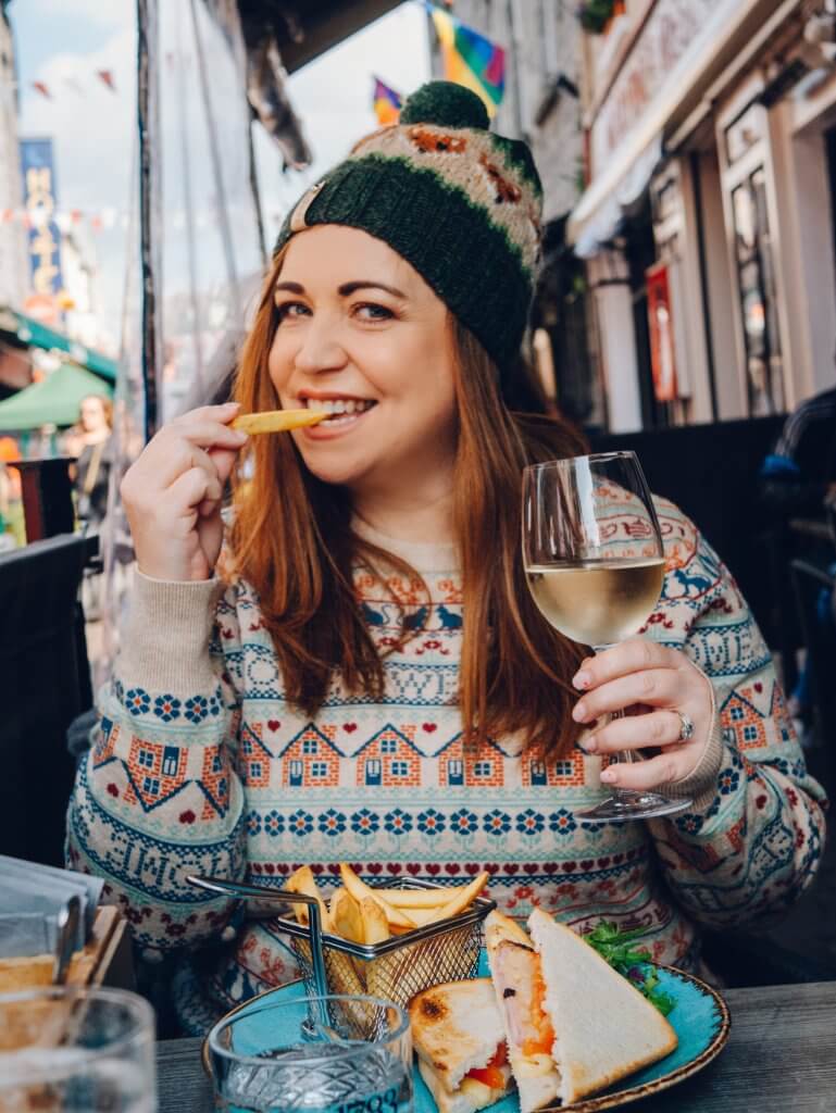 Woman having lunch at Gemelles restaurant on a weekend break in Galway