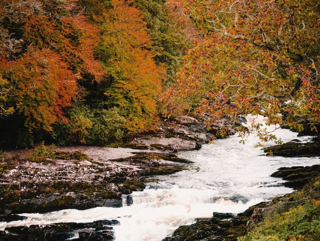 Breathtaking aerial view of Sheen Falls waterfalls, showcasing its idyllic location amid Kenmare's scenic beauty.