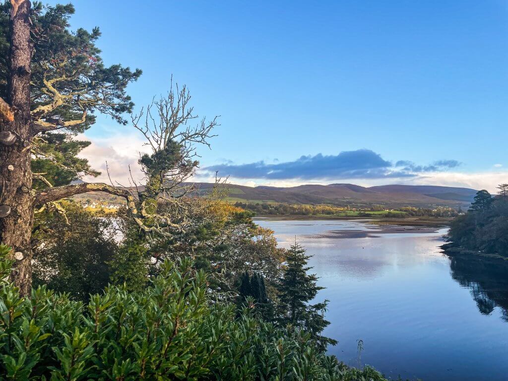Sheen Falls Lodge's outdoor garden, provides a perfect spot to unwind and admire the scenic beauty of Kenmare, Ireland.