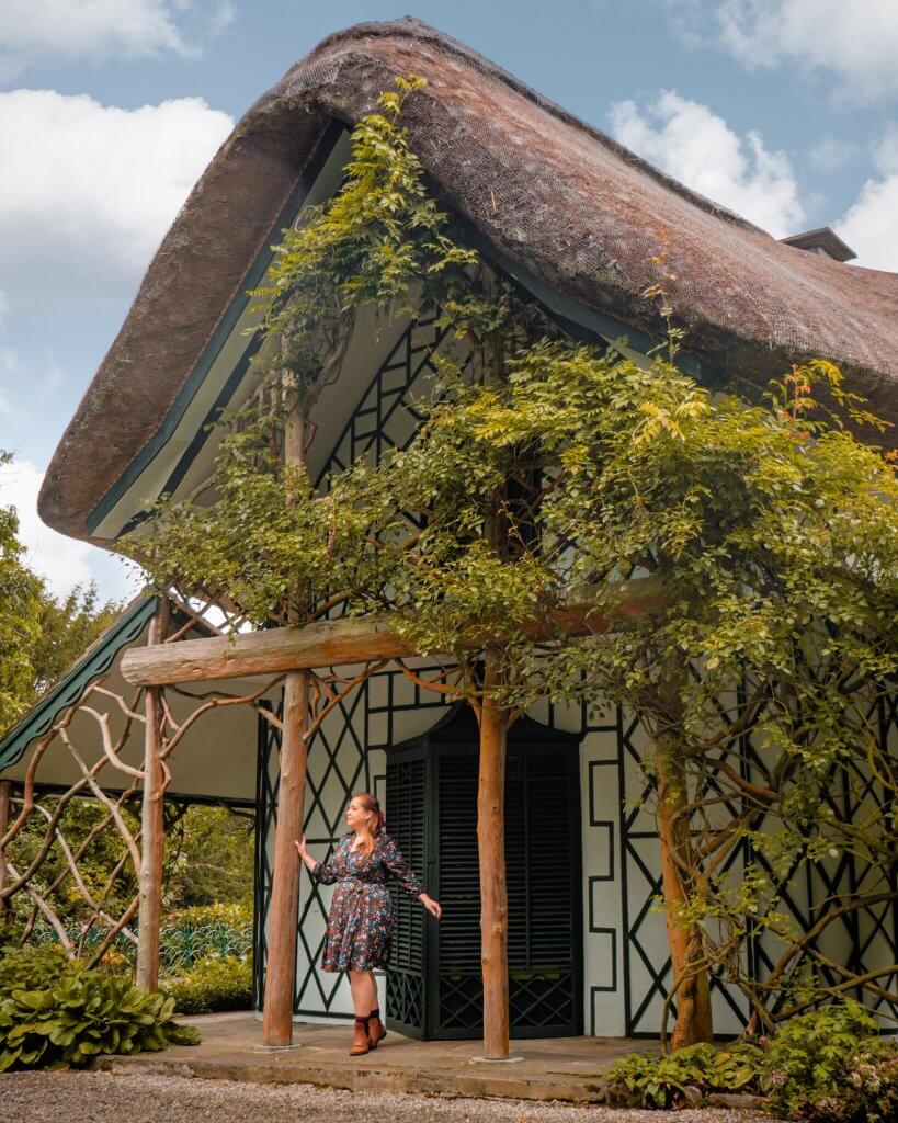 Exterior of Swiss Cottage in Cahir Tipperary Ireland covered in roses
