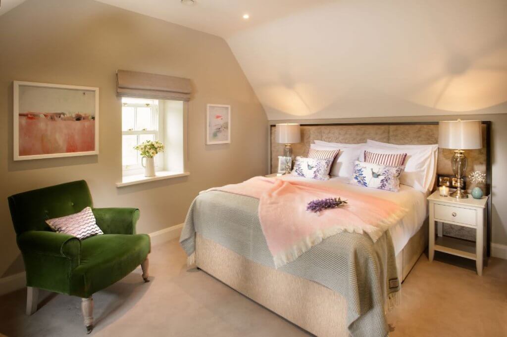 Unique places to stay in Ireland. Bedroom of The Hawthorn Cottage in Doolin