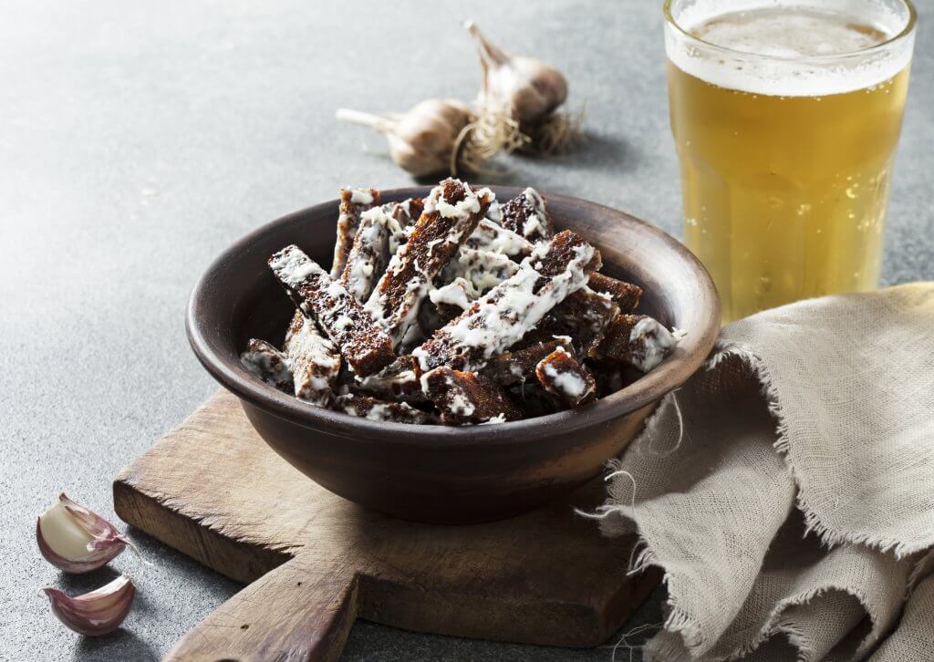 A bowl of Kepta Duona, fried bread with cheese dip, a speciality in Vilnius Lithuania