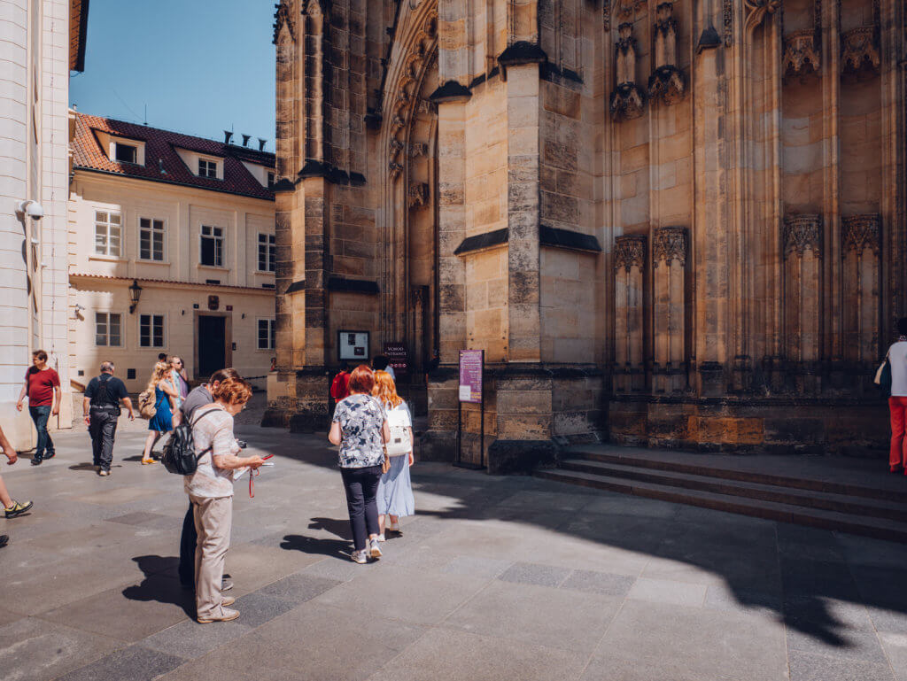 People walking in the courtyard of Prague Castle during a 2 day Prague itinerary