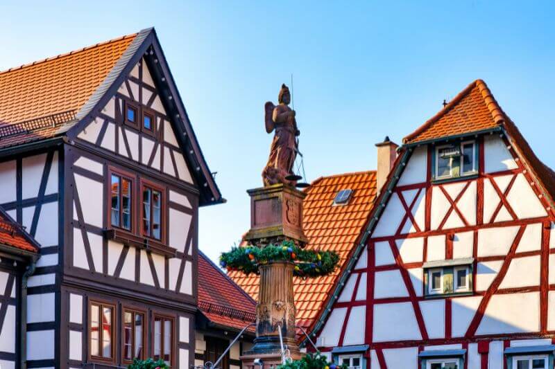 Quiet street in Michelstadt lined with well-preserved half-timbered houses.