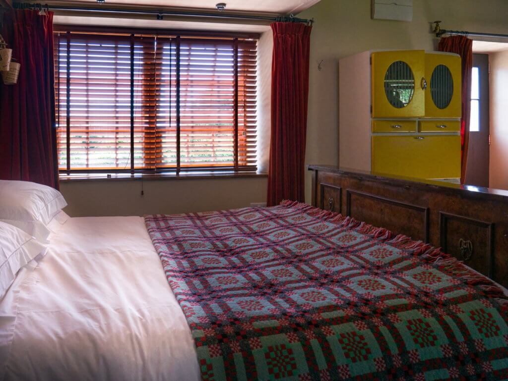 Traditional Welsh blanket on a bed in Wales