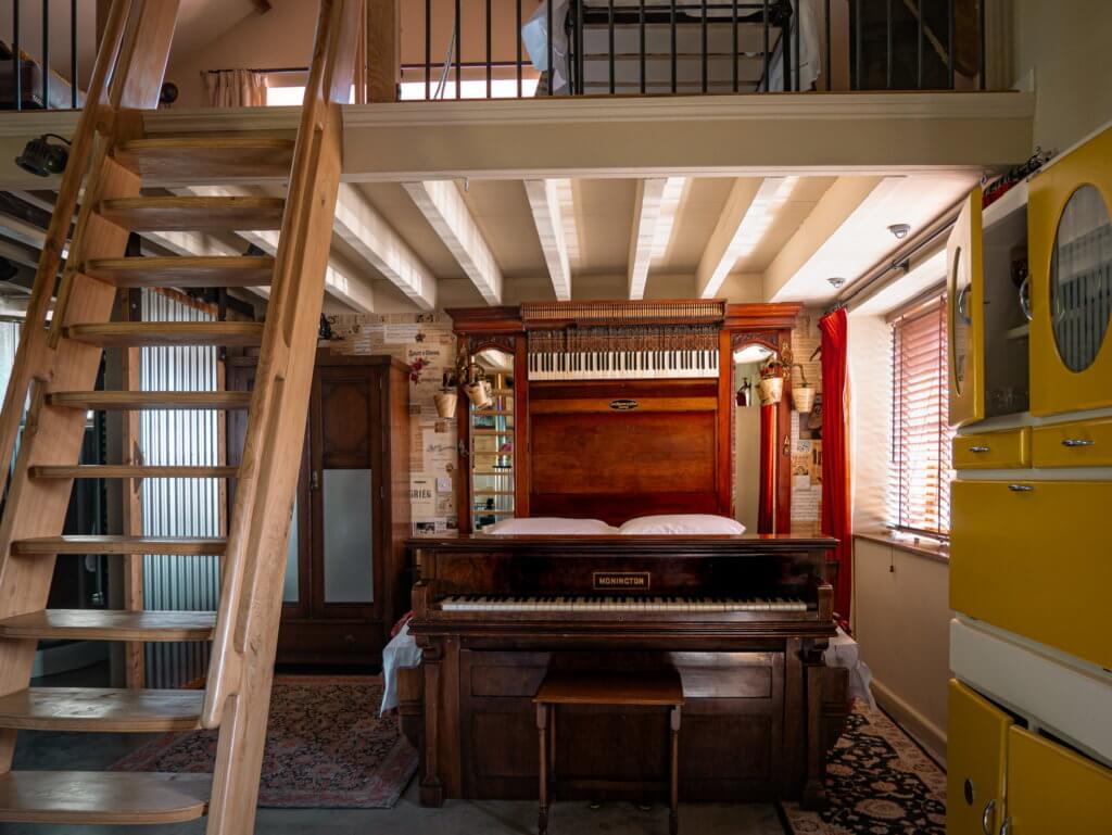 A bed made from a piano at quirky accommodation in Llandysul in Wales