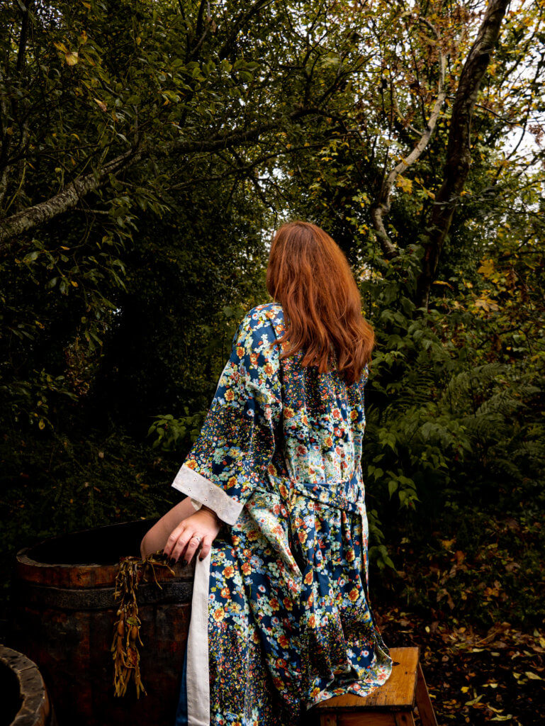 Woman enjoying a seaweed bath at Beds of Silk glamping in Ireland