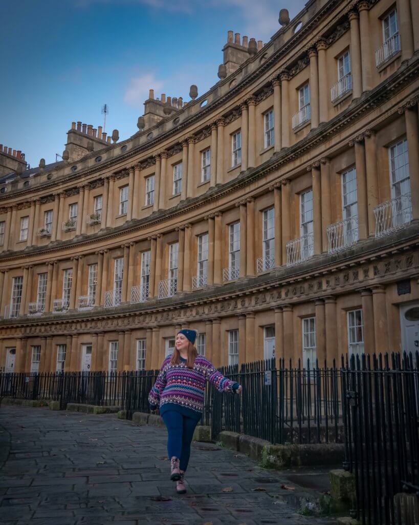 Woman in a Christmas jumper enjoying Christmas in Bath