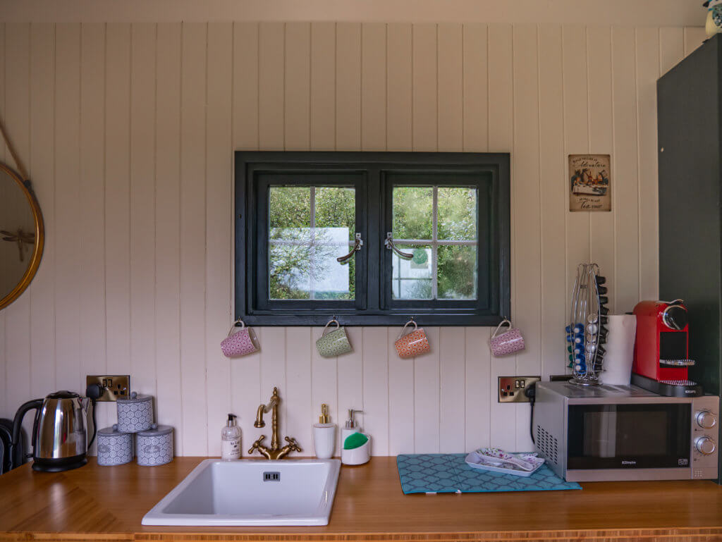 Kitchen of a Shepherds Hut at Beds of Silk glamping in County Clare the perfect romantic Autumn break in Ireland