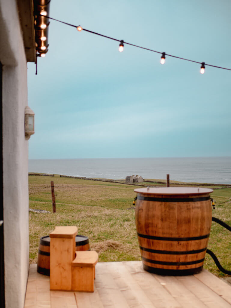 Outdoor hot tub at Doolins Cottage