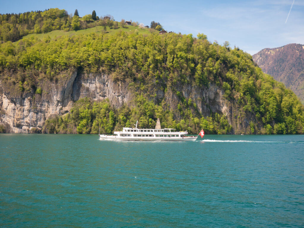Modern motorboat on Lake Lucerne part of the journey on the Gotthard Panorama Express