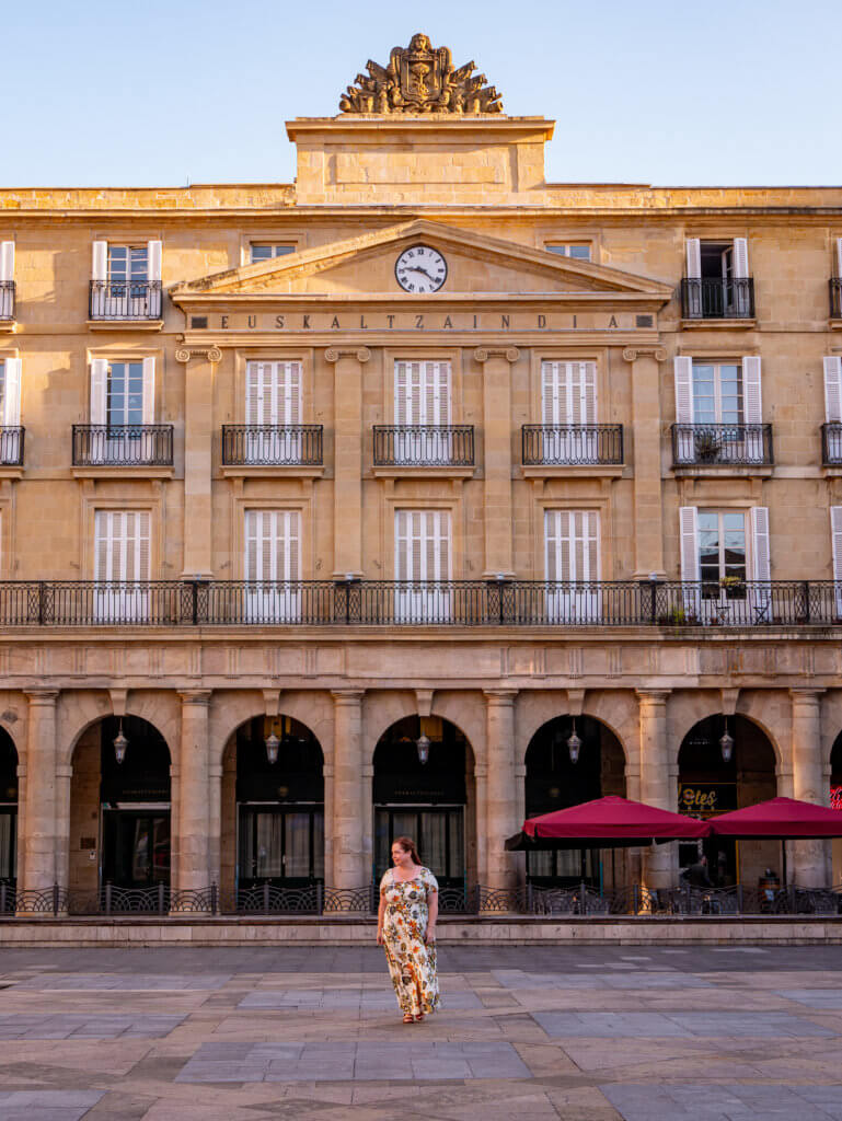 Nicola Lavin, a travel writer with Our Unique Stays, walks in Plaza Neuva in Bilbao Spain