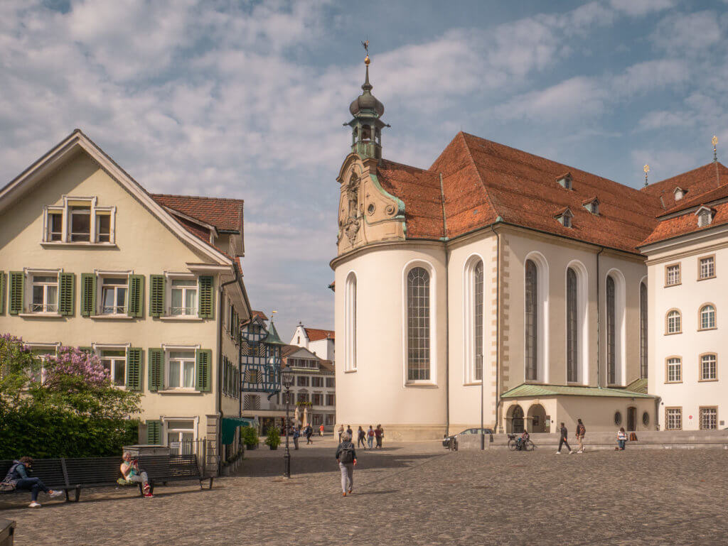 The Baroque Abbey Cathedral of Saint Gall surrounded by fairytale buildings in St. Gallen Switzerland