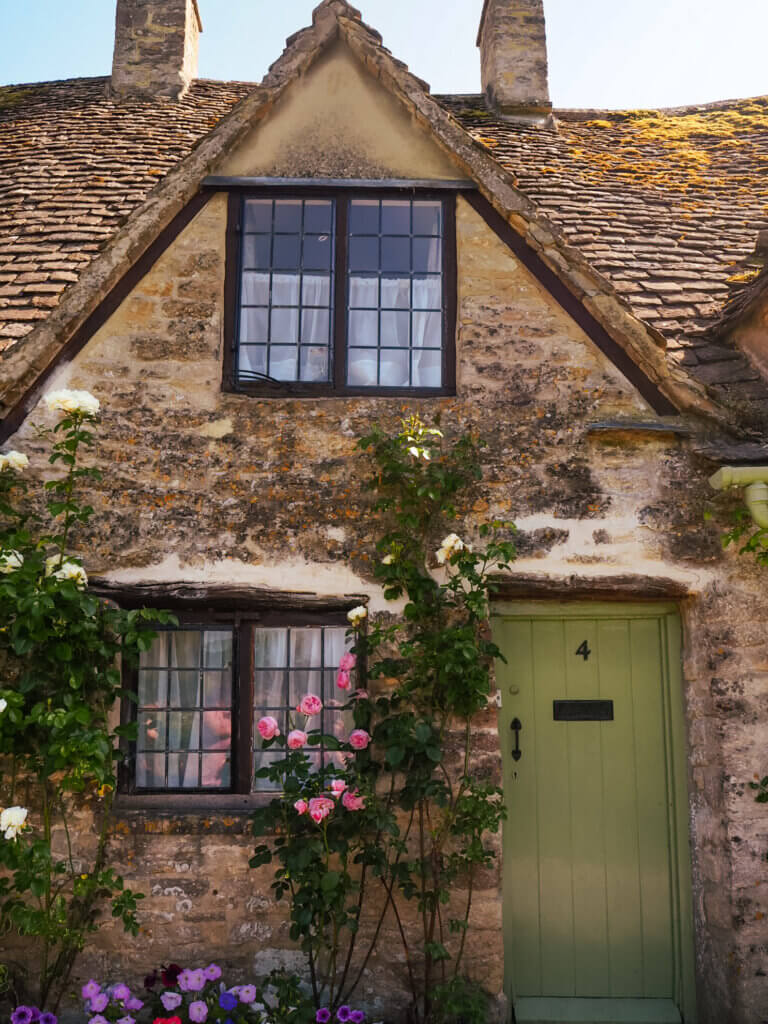 Idyllic cottages of Arlington Row, Bibury - quintessential Cotswolds charm.