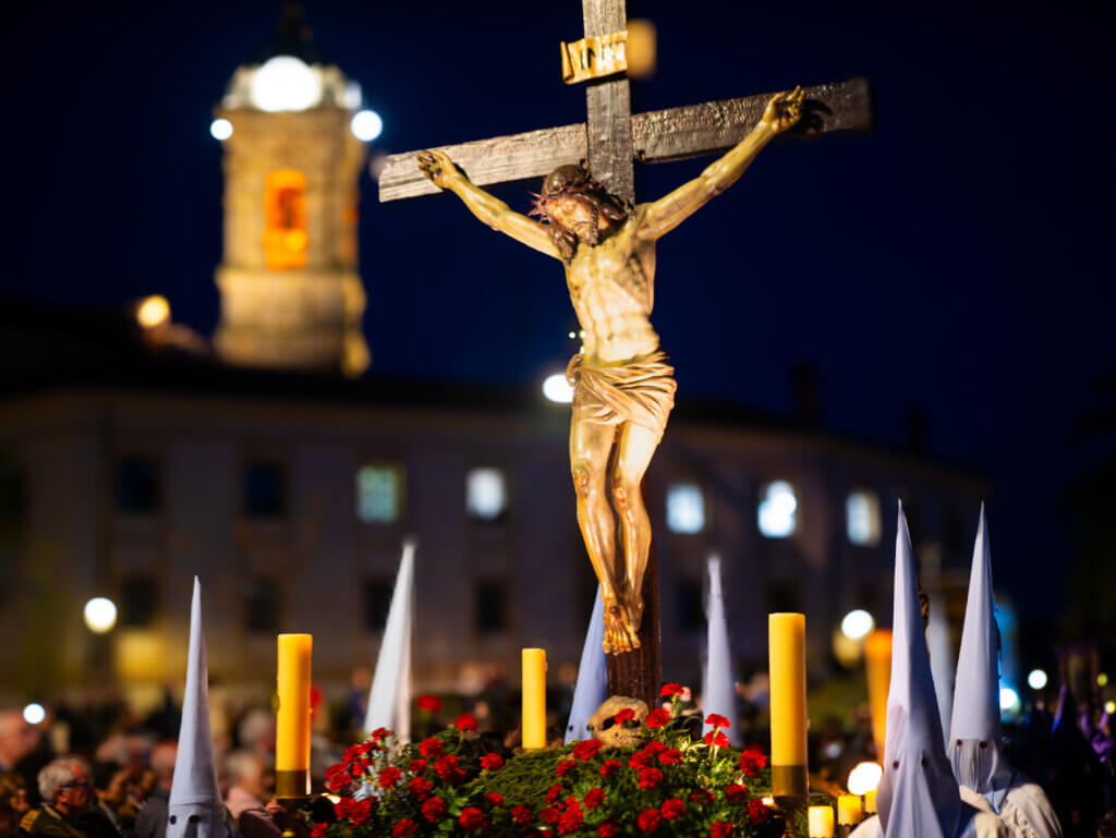 Seville's Semana Santa: A close-up of a decorative float adorned with flowers and religious symbols.