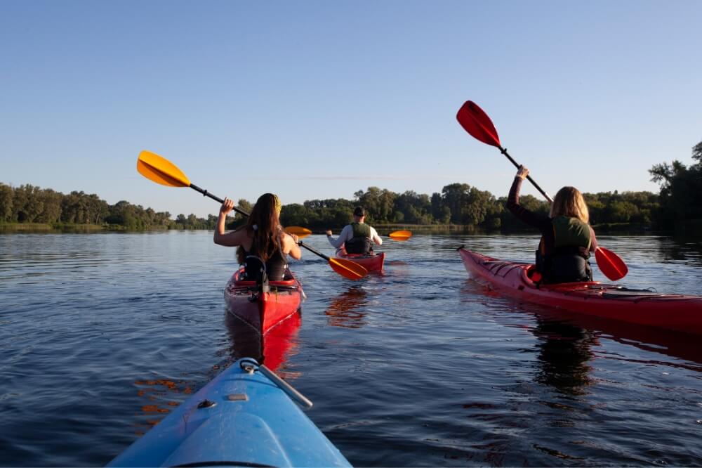 People kayaking on Lough Derg in Tipperary.