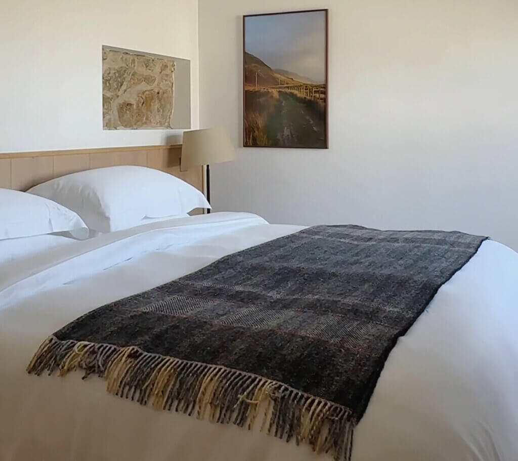 Bedroom in Within the Village, a luxurious self-catering cottage in Connemara, Ireland.