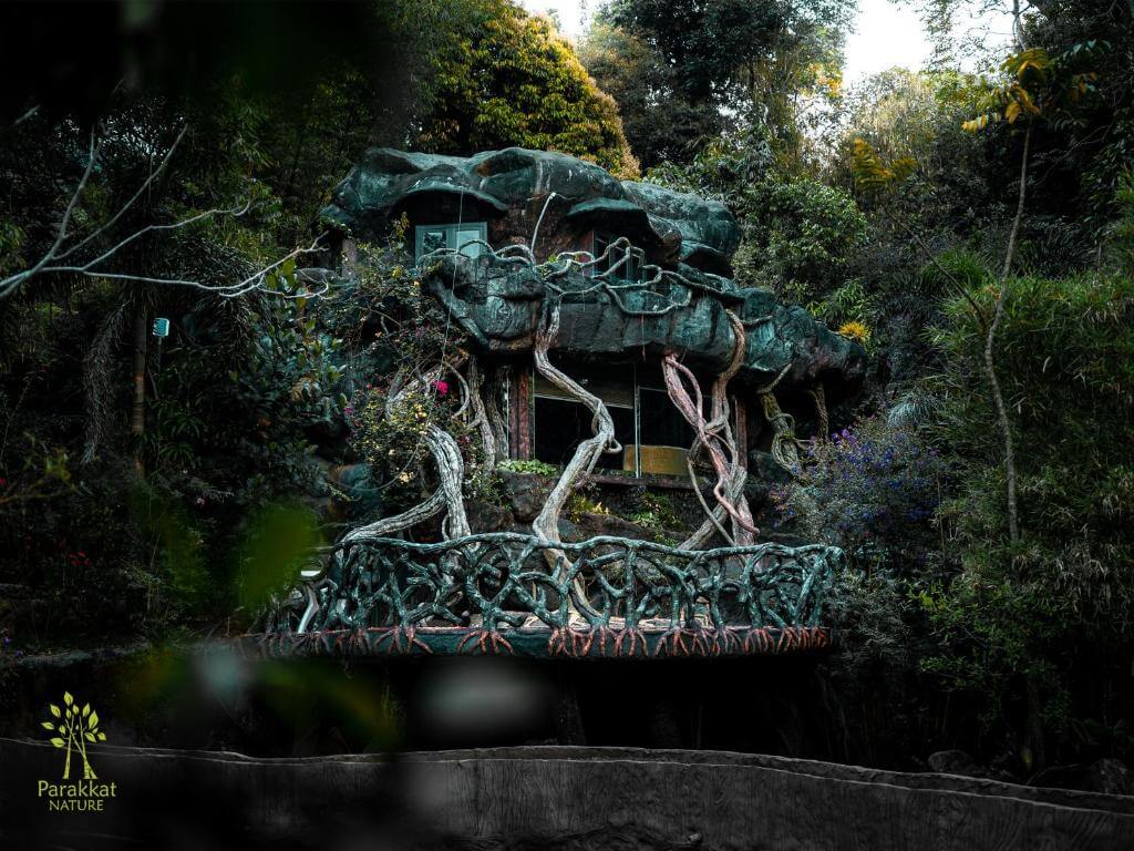 Unique luxury lodge at Parakkat 5 star hotel in Munnar. The exterior of the lodge looks like the roots of a tree.