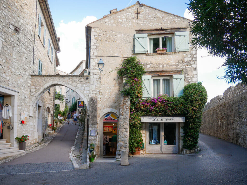 View down a cobbled path with shops in Saint Paul de Vence