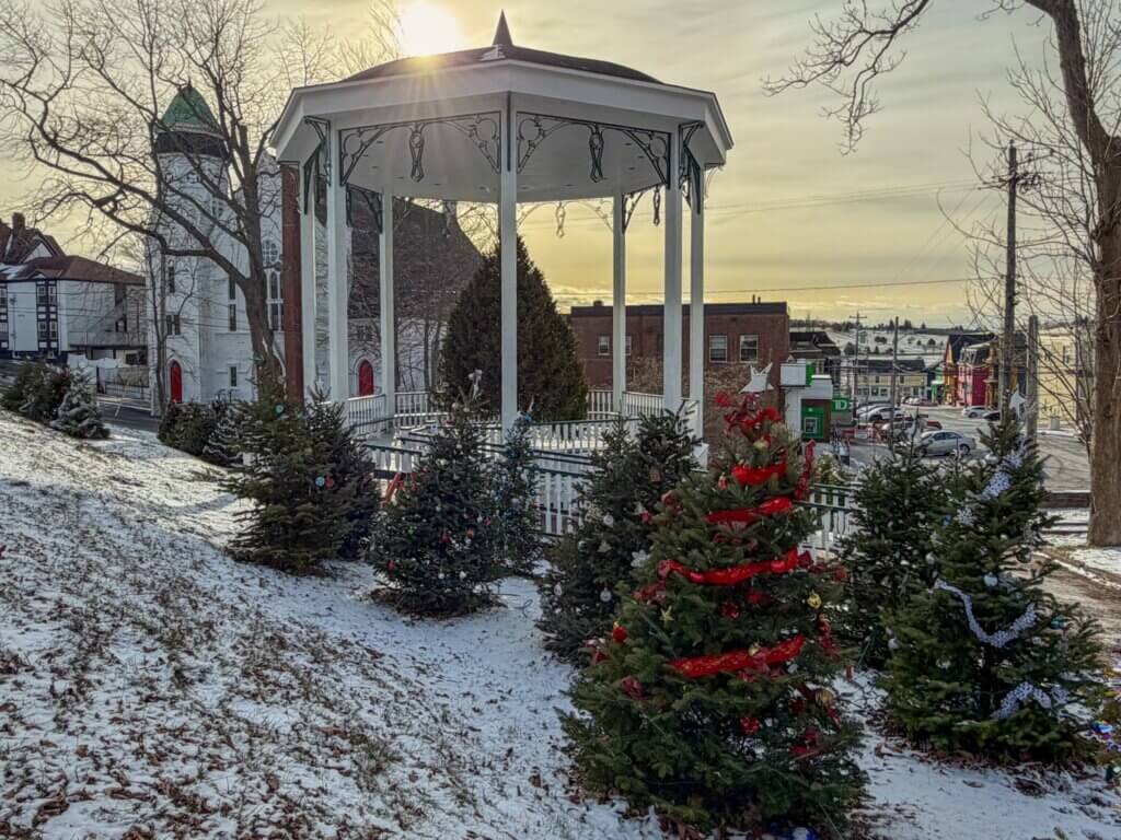 The bandstand in Lunenburg, Nova Scotia surrounded by Christmas trees.