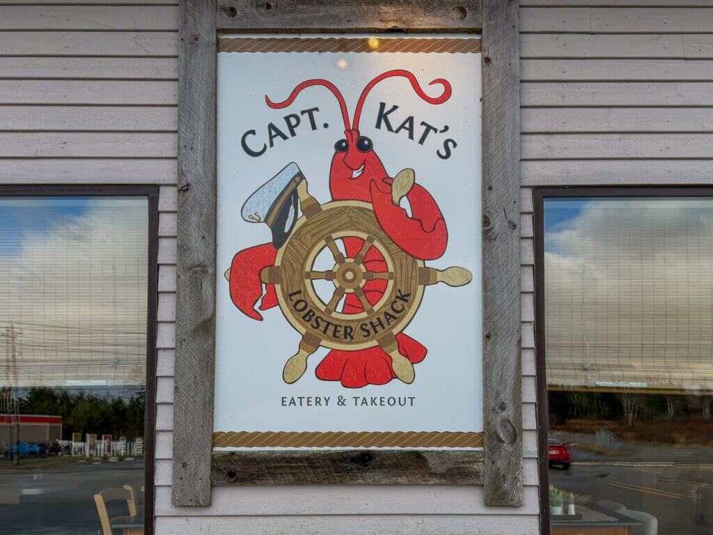 Restaurant sign for Captain Kat's Lobster Shack in Barrington, Nova Scotia.