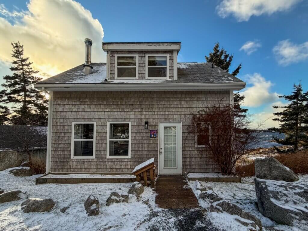 Exterior of Crow's Nest a cute little cottage at Oceanstone resort in Nova Scotia